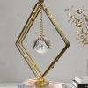 Add a touch of celestial magic to your home with our Floating Crystal Sphere Geometric Sculpture.
