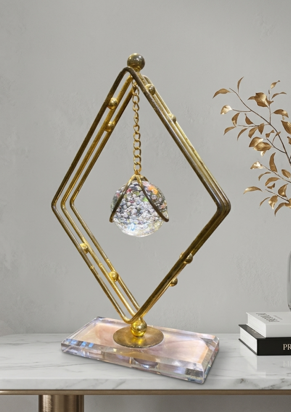 Add a touch of celestial magic to your home with our Floating Crystal Sphere Geometric Sculpture.